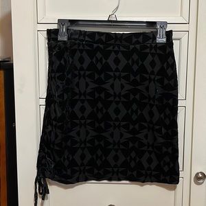 3/$12  Dressy mini skirt with velvet detail. Size M. NWT